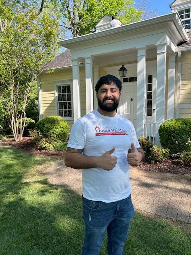 Nechi, crew leader at Nashville House Painters